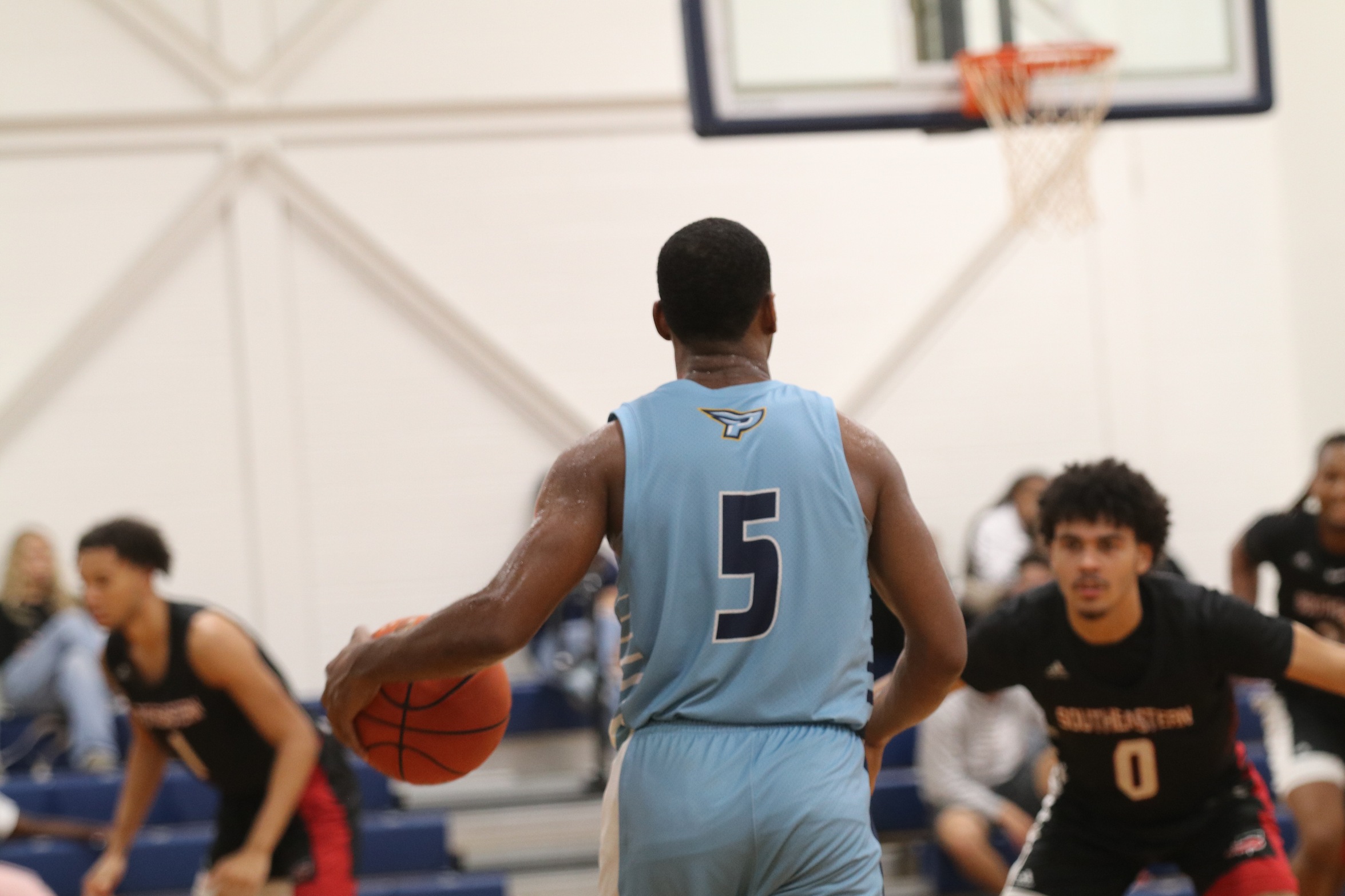 Men&rsquo;s Basketball cools down the Fire at home