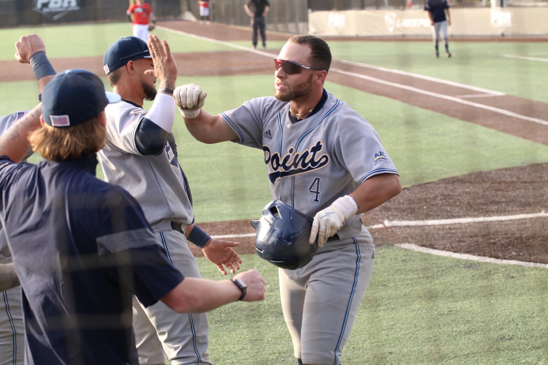 Team effort guides baseball to series victory over Bryan in extra innings